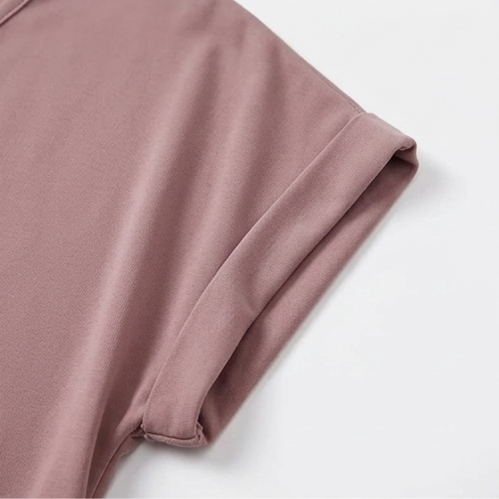 Women's casual cap sleeve top with a flattering v-neck and trendy twist front for comfort.
