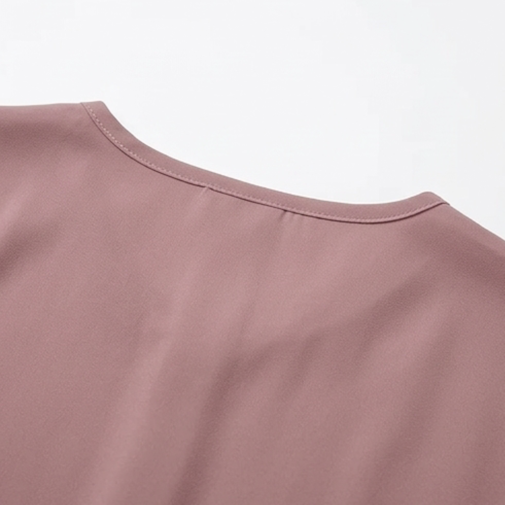 Effortless women's fashion: V-neck, cap sleeves, twist front top. Perfect for daily style.