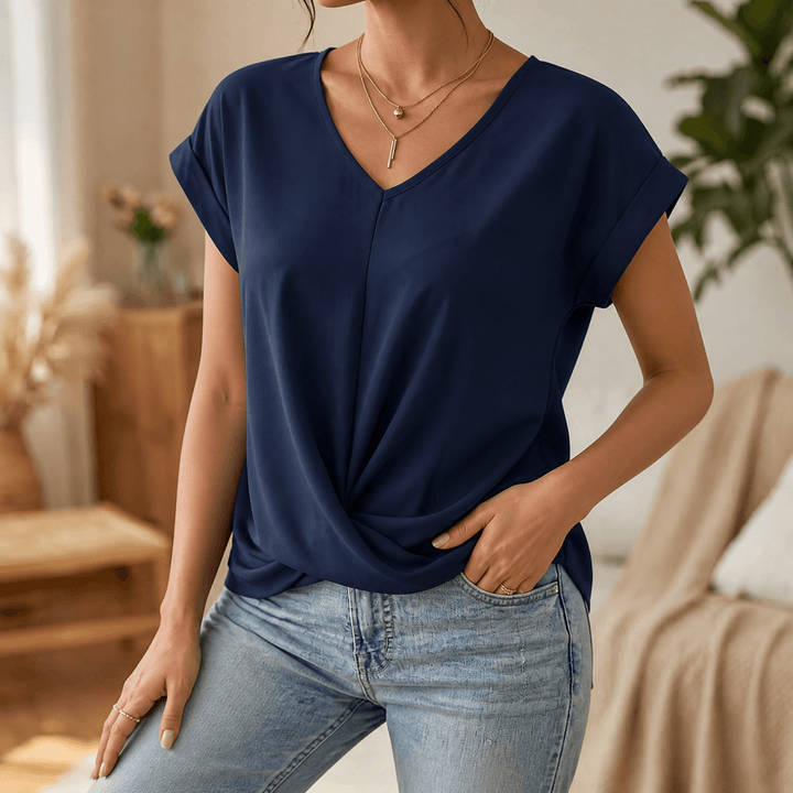 Fashion-forward women's top: V-neck, cap sleeves, and an effortless twist front. Daily wear.