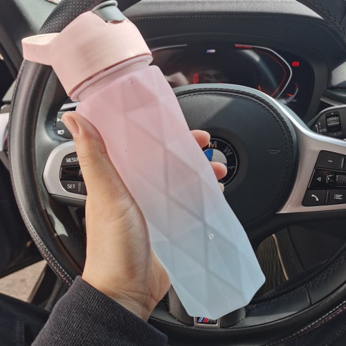 Girls' outdoor gear: Misting water bottle with spray trigger for ultimate hydration.