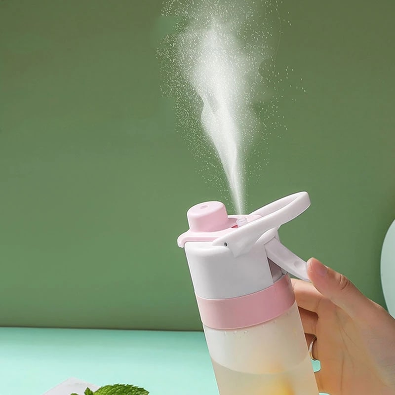 Girls' gym bag essential: Misting water bottle with spray for quick refreshment.