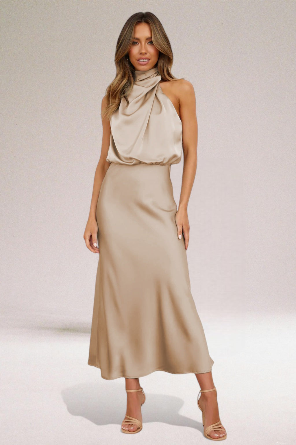 Glamorous women's flowy halter maxi dress, ideal for elegant evening events and a stunning silhouette.