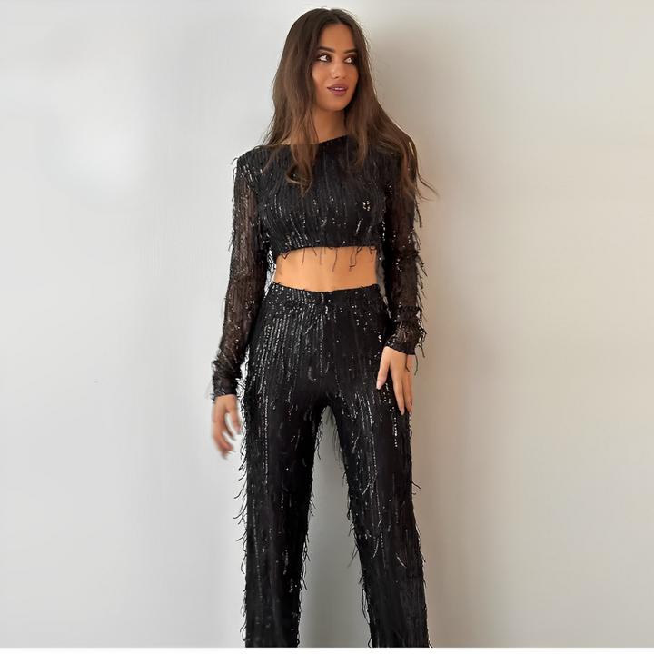 Dazzling sequin crop top and high-waisted pants set, a glamorous two-piece for women's parties.