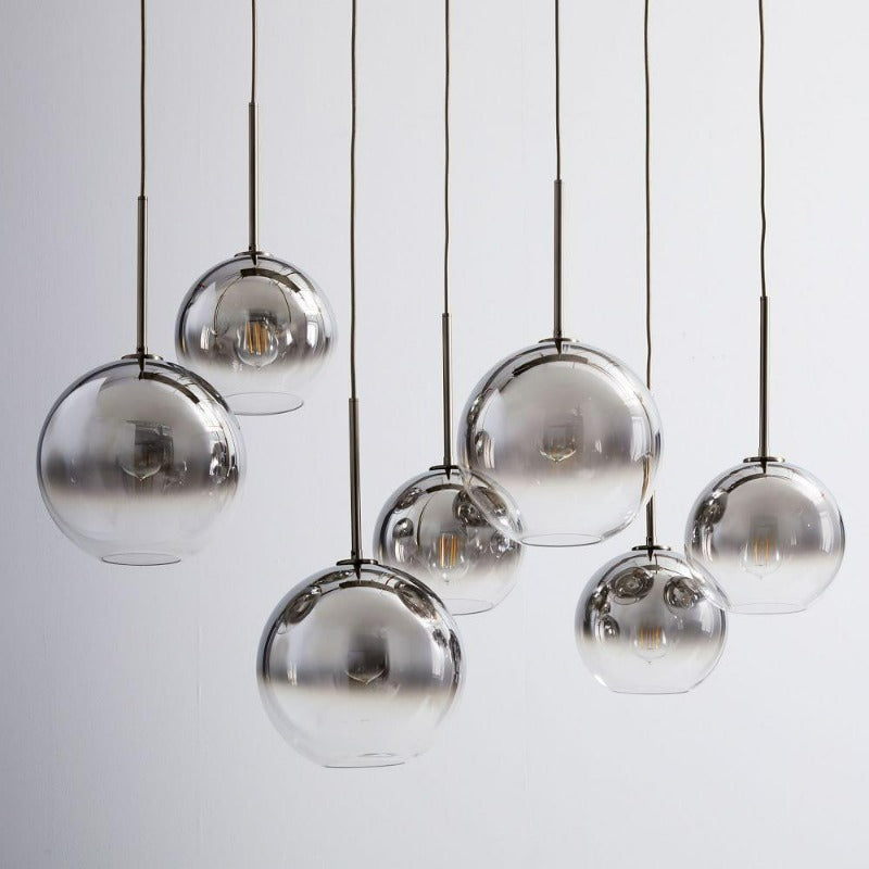 Stylish glass ball pendant light, an elegant ceiling fixture for contemporary home decor.