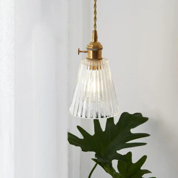 Dining room glass pendant lamp, modern design with transparent finish.