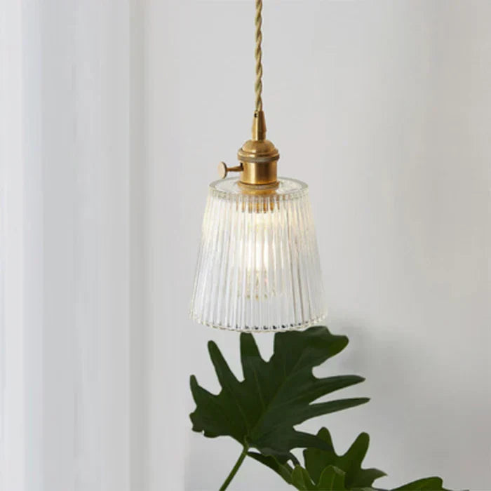 Modern design glass pendant light, enhances dining room and kitchen aesthetics.