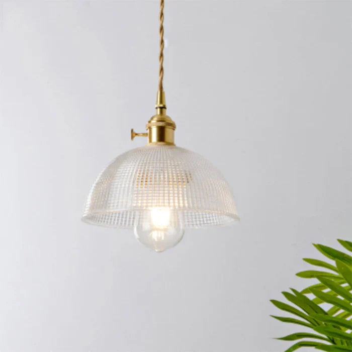 Transparent glass hanging lamp, ideal ceiling light for kitchen island decor.
