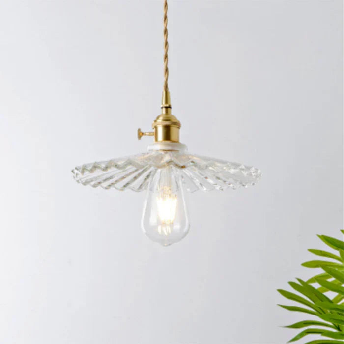 Sophisticated glass hanging lamp, modern design for elegant home decor.