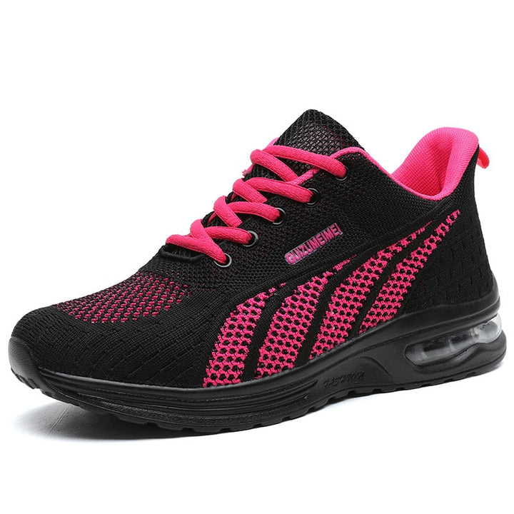Ladies' GlideMotion Run athletic shoes: ergonomic design, cushioned heel, ideal for running, walking, and activewear.