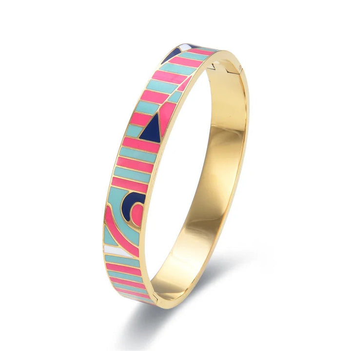 Fashionable gold charm geode cuff bracelet for women. Modern, unique, and elegant accessory.