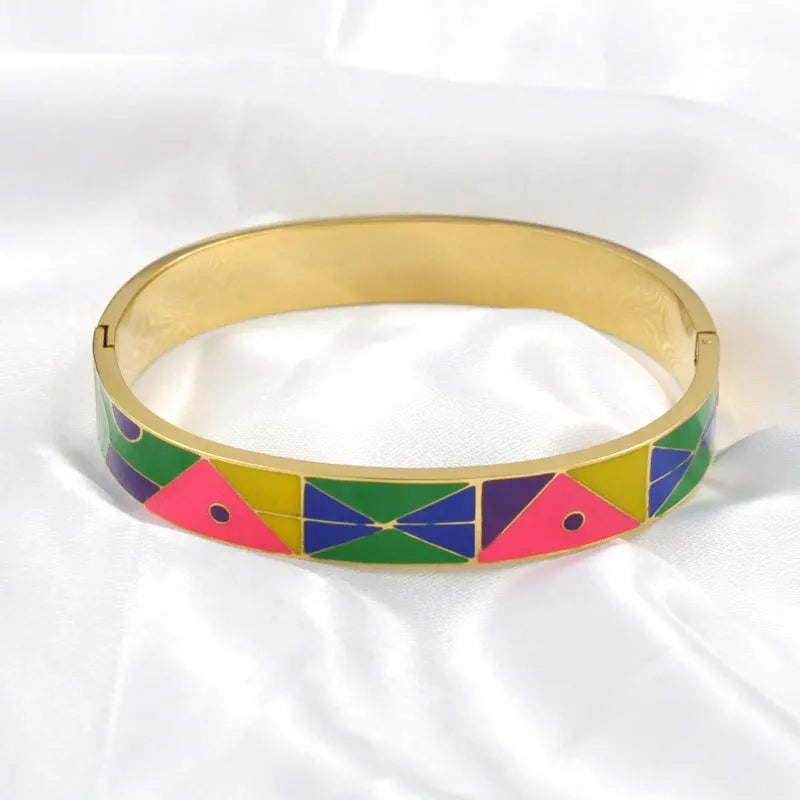 Modern gold geode cuff bracelet. Elegant women's jewelry with a unique charm, perfect for gifting.