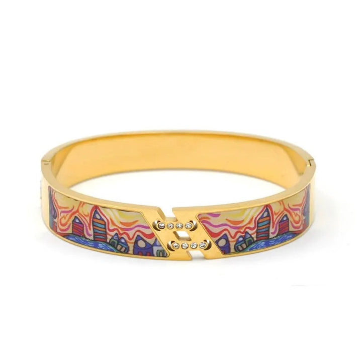 Women's elegant gold geode cuff bracelet. Features a beautiful charm, adjustable and modern accessory.
