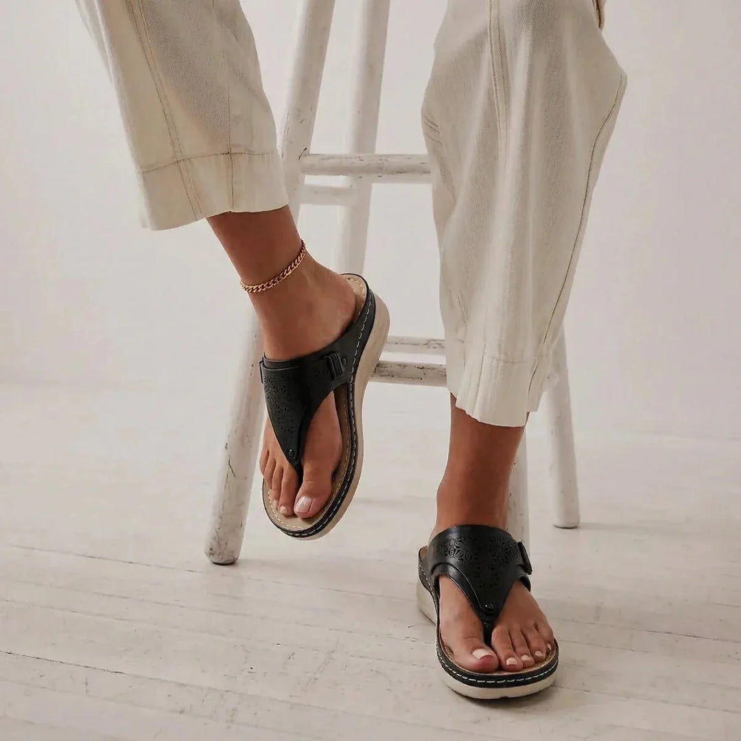 Stylish black women's walking sandals, ergonomic design for arch support & foot comfort.