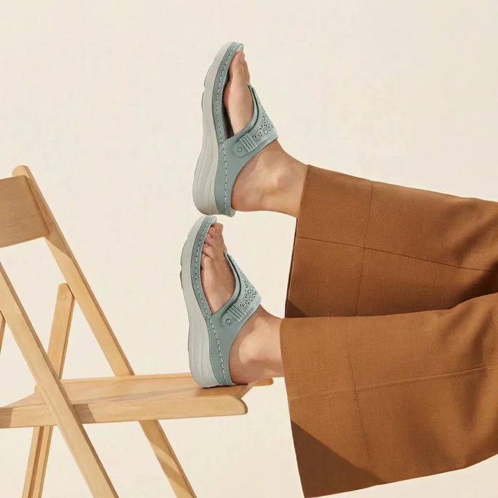 Ergonomic women's sandals in beige, providing excellent arch support & all-day comfort.