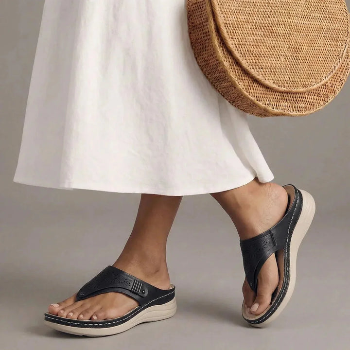 Comfortable green orthopedic sandals for women, offering arch support & everyday wear.