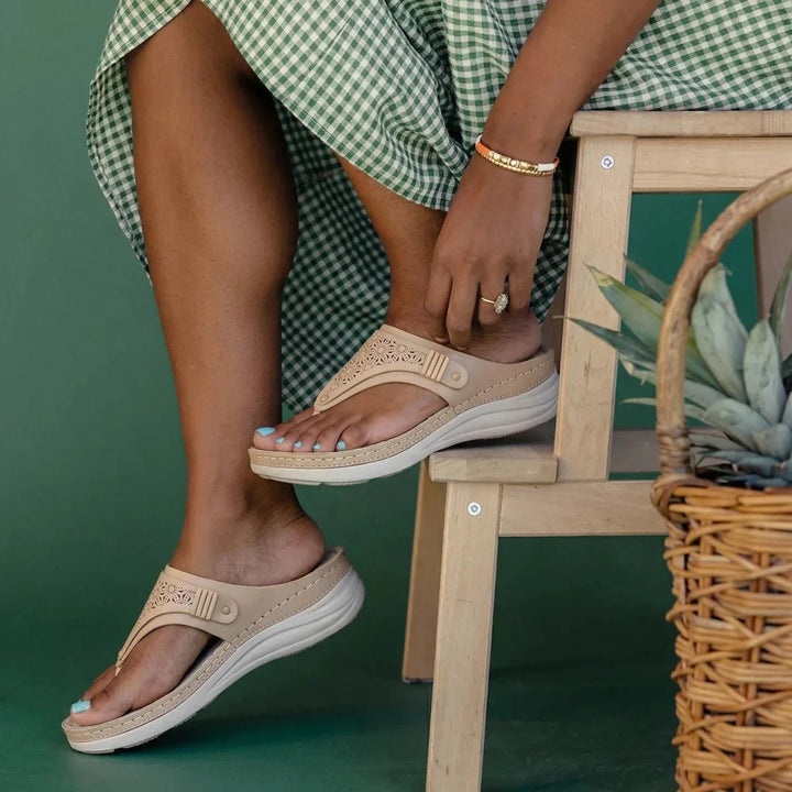 Green ergonomic women's sandals for arch support, ideal for summer & casual wear.