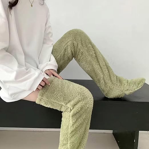 Soft plush women's high socks, designed for cozy winter warmth & lasting foot comfort.