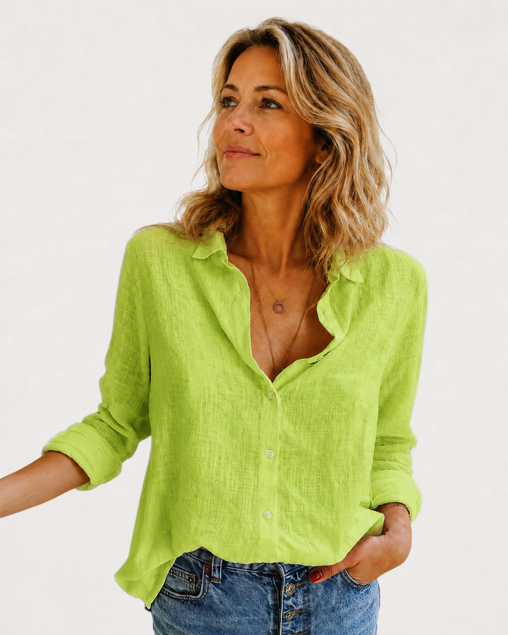 Lightweight women's button-down long sleeve blouse, an essential collared top for comfortable casual and office wear.