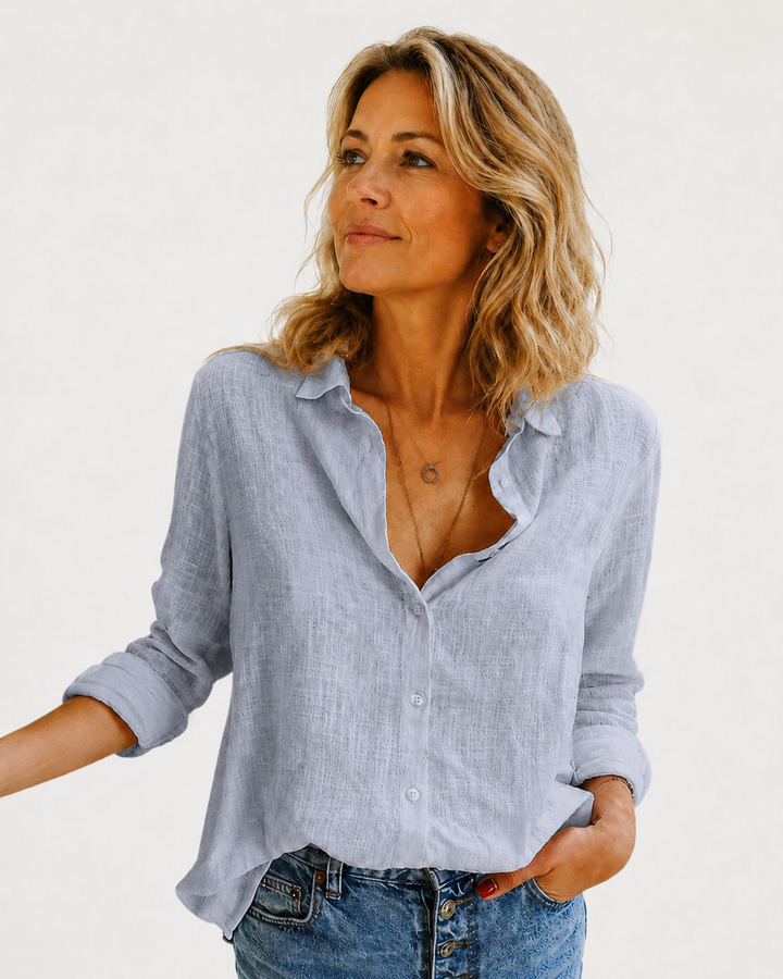 Sophisticated women's long sleeve collared blouse, button-down design for elegant office attire and casual chic.