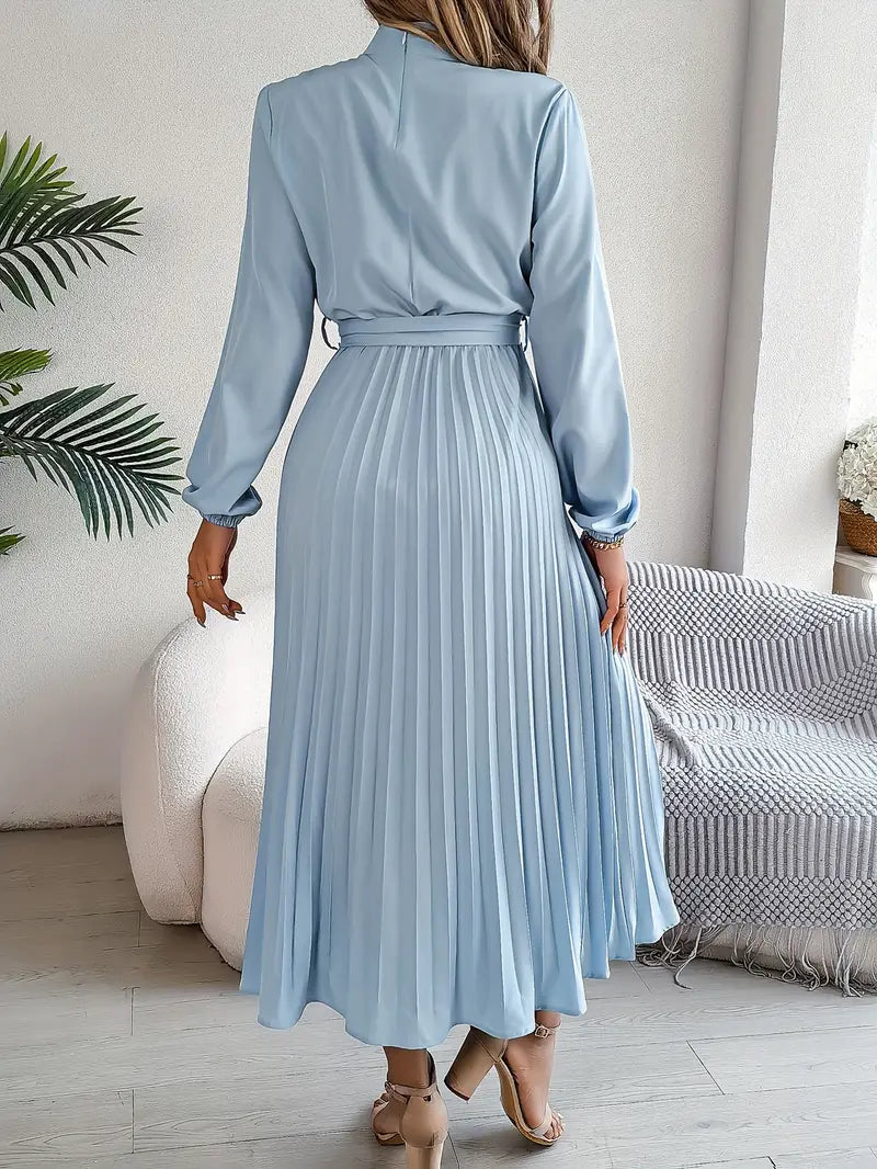 Light blue belted pleated midi dress, perfect for formal occasions or as a wedding guest outfit.