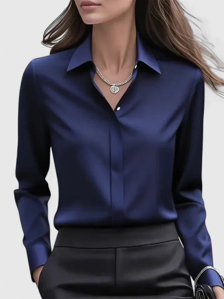 Elegant women's long-sleeve blouse with sophisticated concealed placket, ideal for professional office wear.