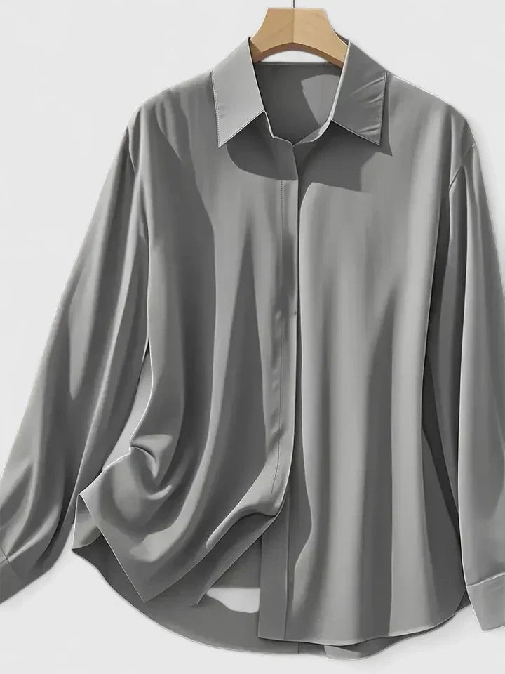 Streamlined women's long-sleeve office blouse, elegant concealed placket creates a clean, sophisticated silhouette.