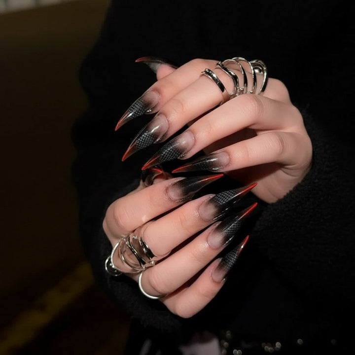 Assorted spooky Halloween false nails for women, perfect costume accessory for parties, cosplay, or dress-up.