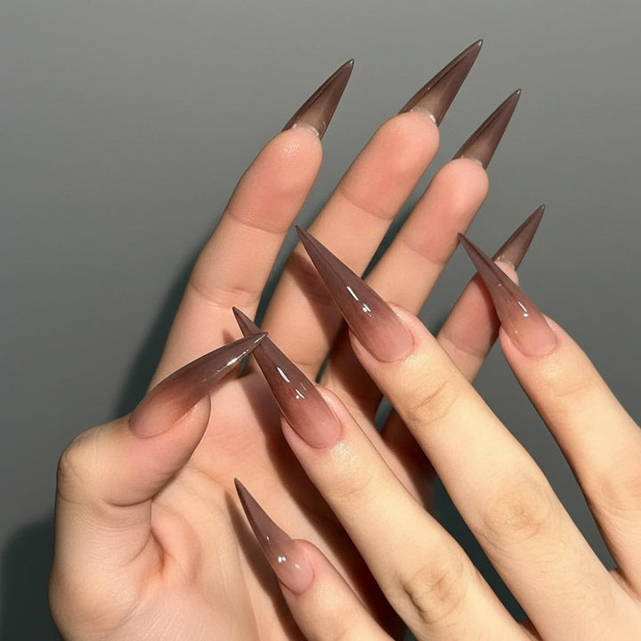 Women's spooky press-on nails, essential Halloween party accessory for a quick, ghoulish costume transformation.