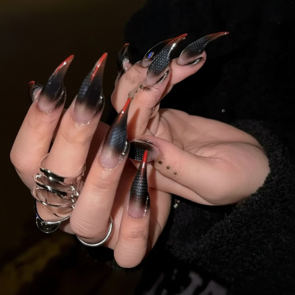 Women's reusable spooky false nails for Halloween, featuring unique designs for an eerie costume accessory.