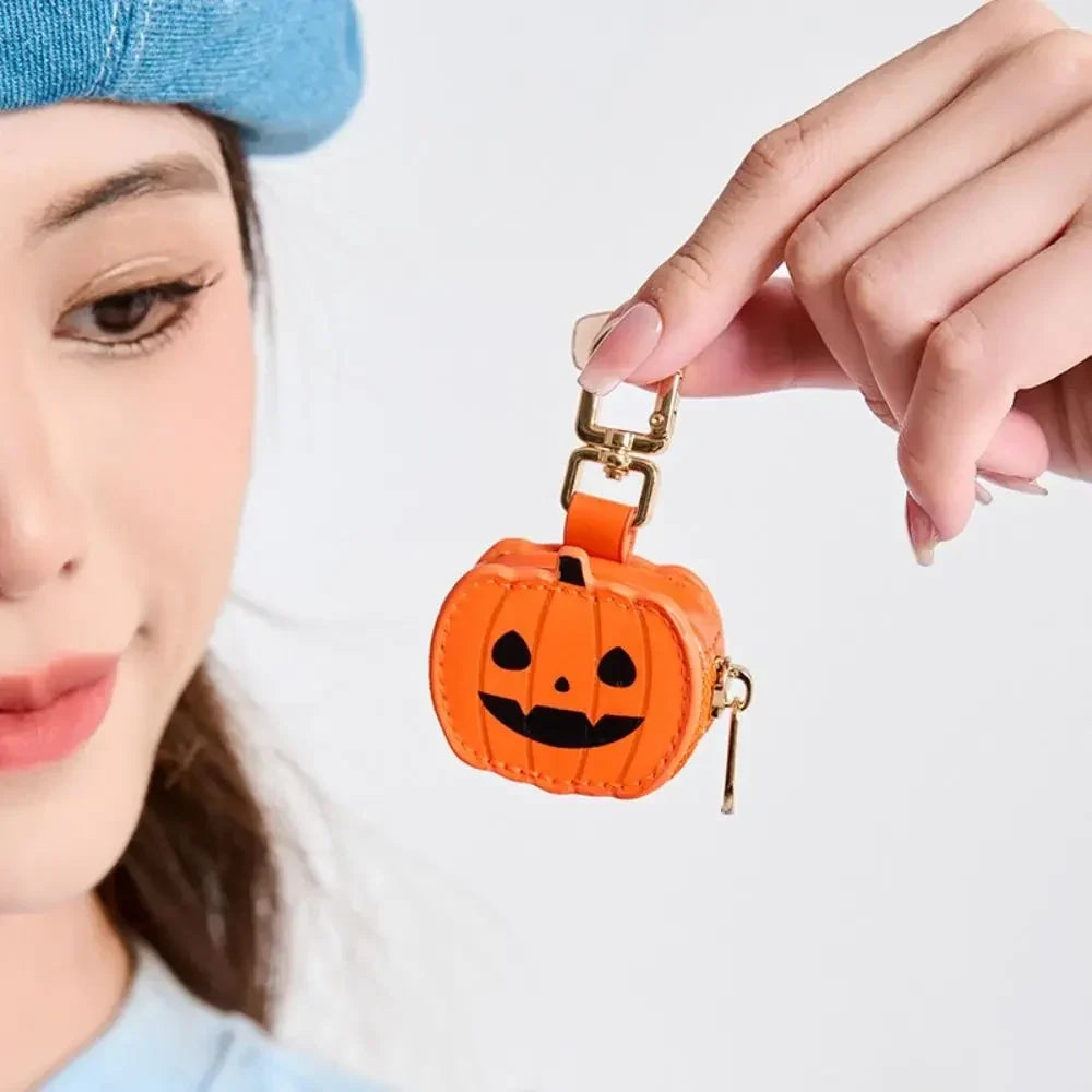 Unisex ghost PU leather keychain, a compact mini storage bag for Halloween & Christmas trinkets and charms.