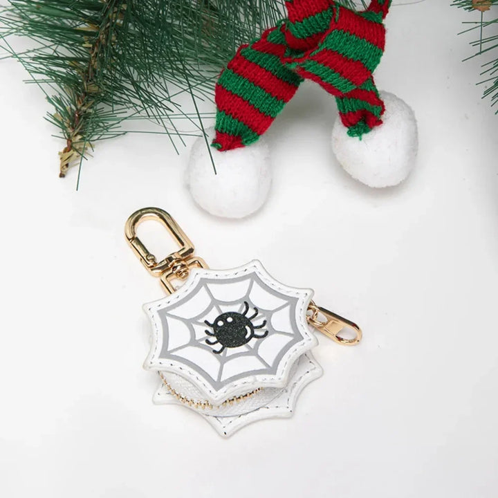 Festive PU leather ghost keychain and trinket holder, perfect for Halloween or Christmas bag accessory.