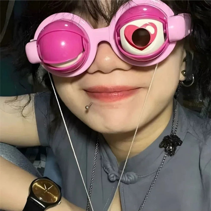 Pink Halloween novelty glasses, a fun party accessory for costume dress-up, photo booths, or joke gifts.