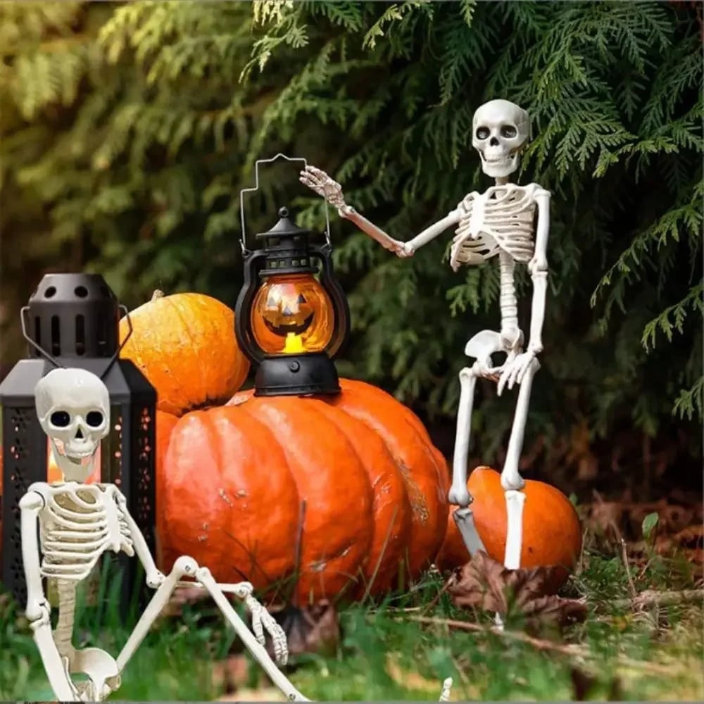 Poseable plastic skeleton decoration, perfect for outdoor Halloween parties & seasonal yard art.
