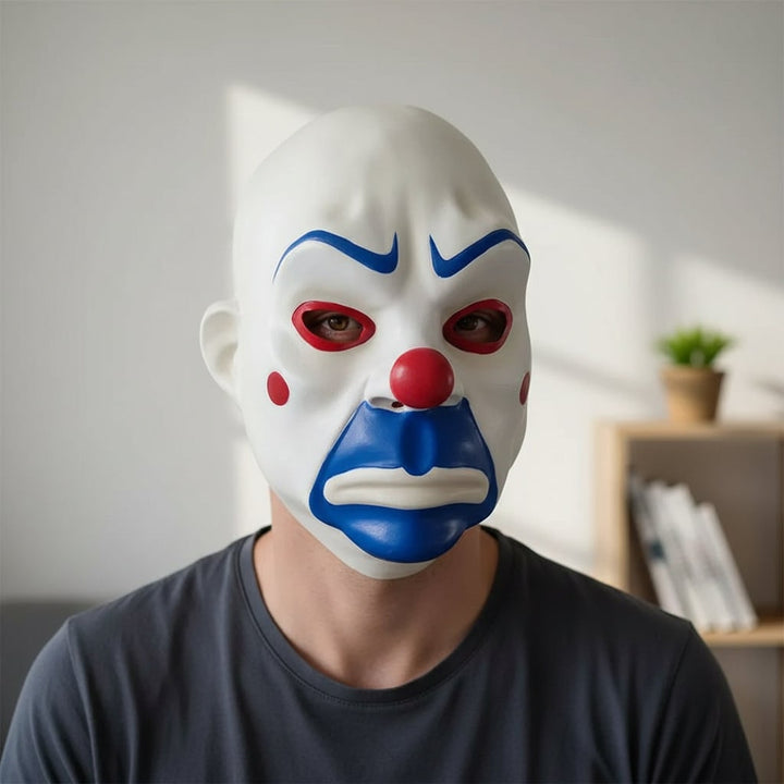 Creepy full-face clown mask, unisex adult Halloween party accessory. Scary costume for cosplay, fright, or masquerade.