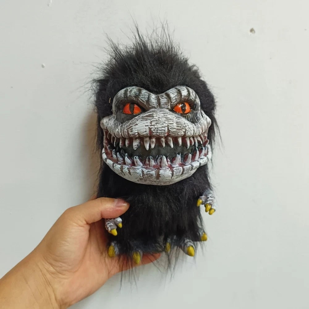 Collectible creepy monster plush toy, perfect for Halloween decor or a spooky gift.