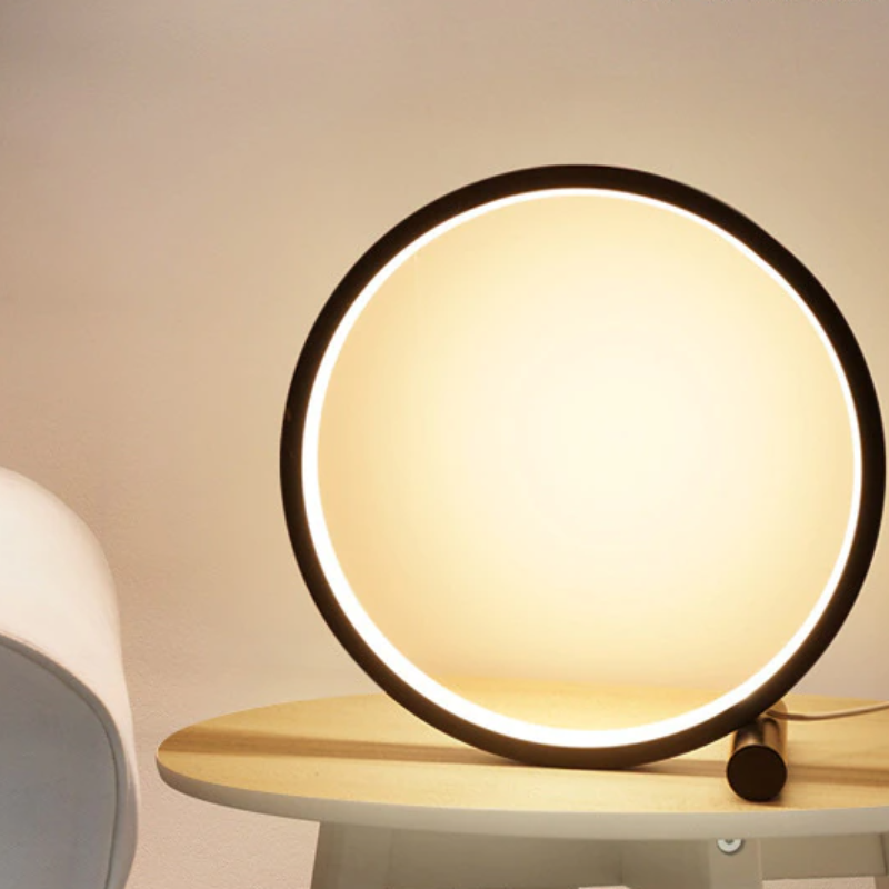 Dimmable Halo Ring LED desk lamp by Nvroome, modern minimalist design, aluminum, ideal mood lighting.