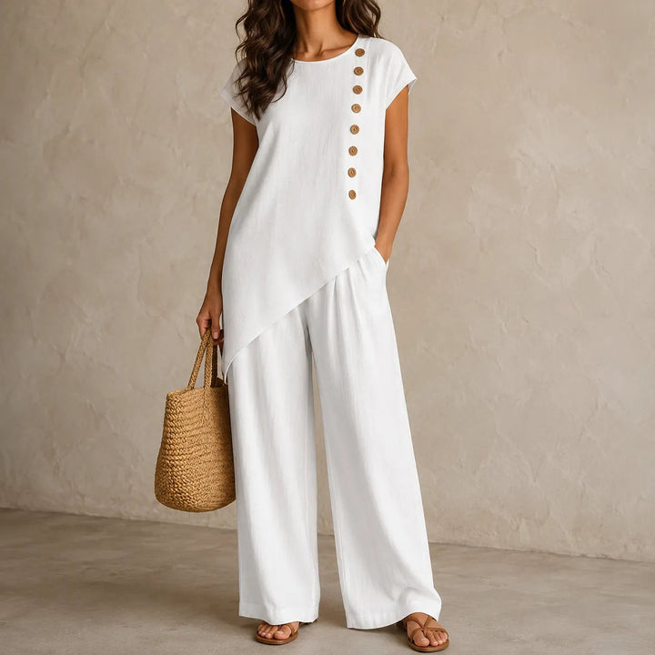 Women's effortless co-ord set with wide-leg pants & asymmetric top for chic summer casual wear.
