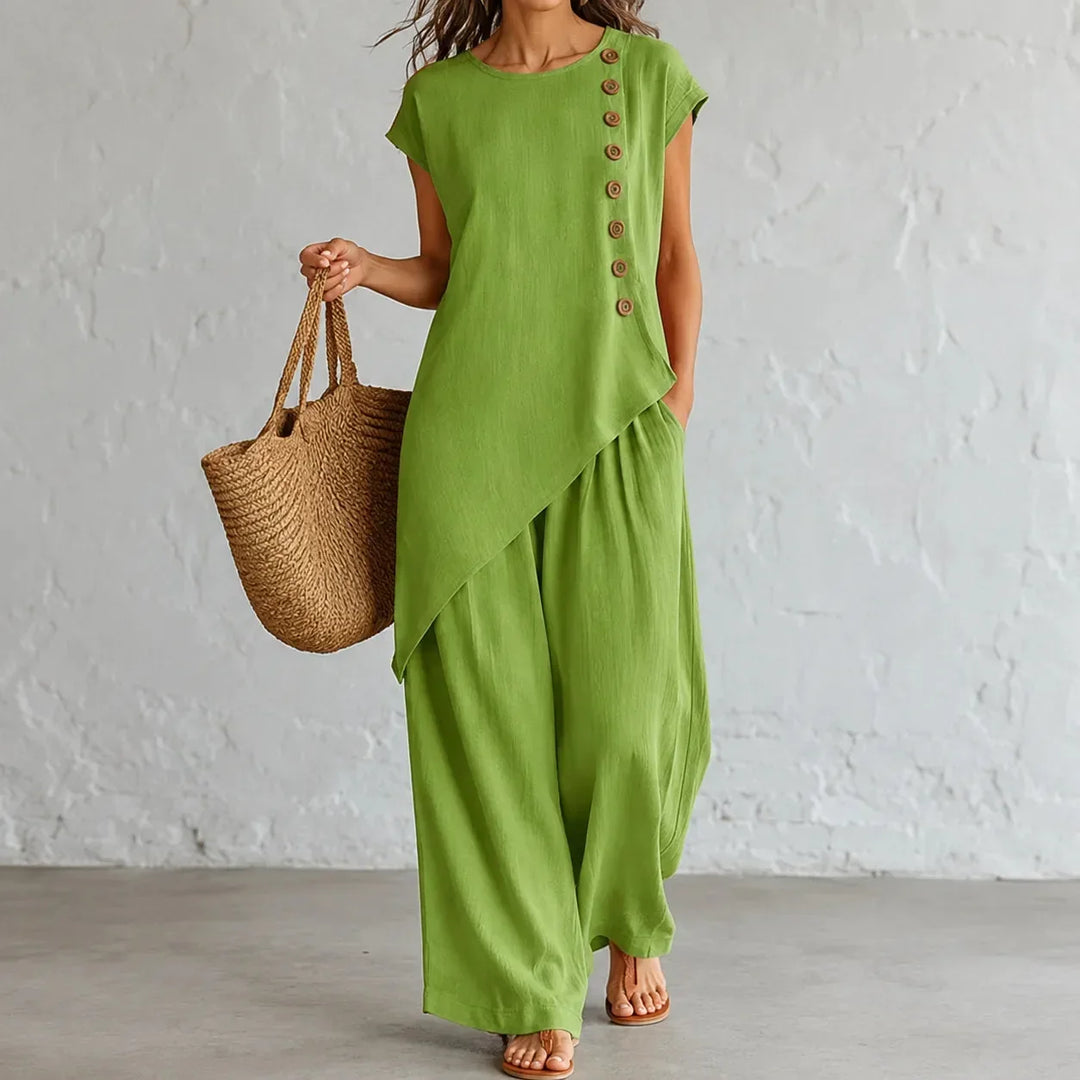 Women's summer-ready co-ord set with flowy wide-leg pants & an elegant asymmetric top for a relaxed fit.
