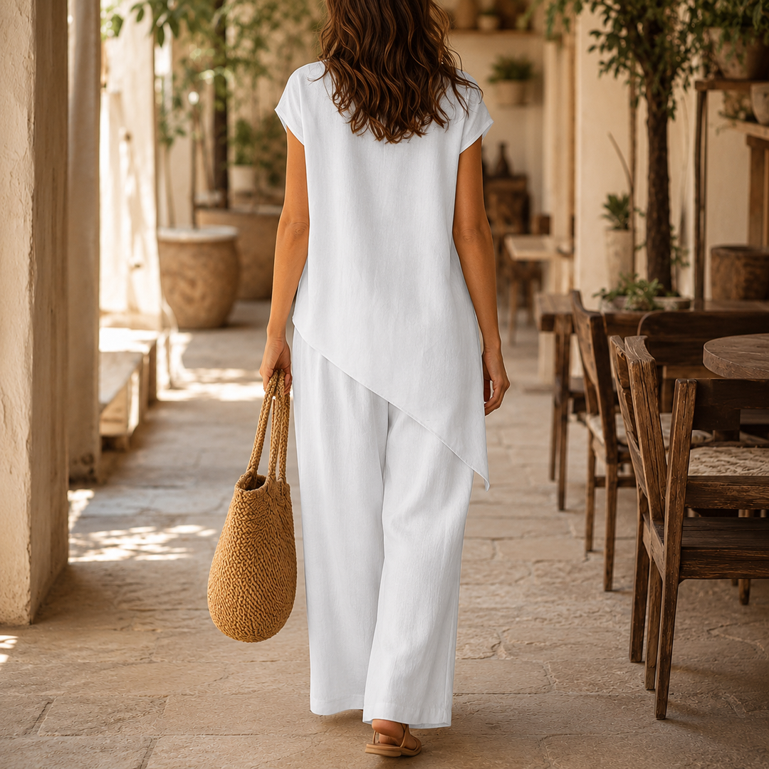 Chic women's matching set: flowy wide-leg pants & an elegant asymmetric top, perfect for spring.