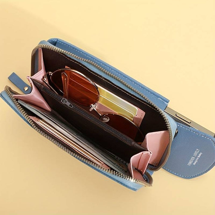 Smart women's daily organizer: crossbody phone wallet with touch screen functionality.