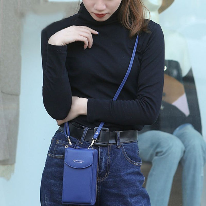 Women's practical crossbody travel wallet in PU leather, with a dedicated touch screen phone pouch.