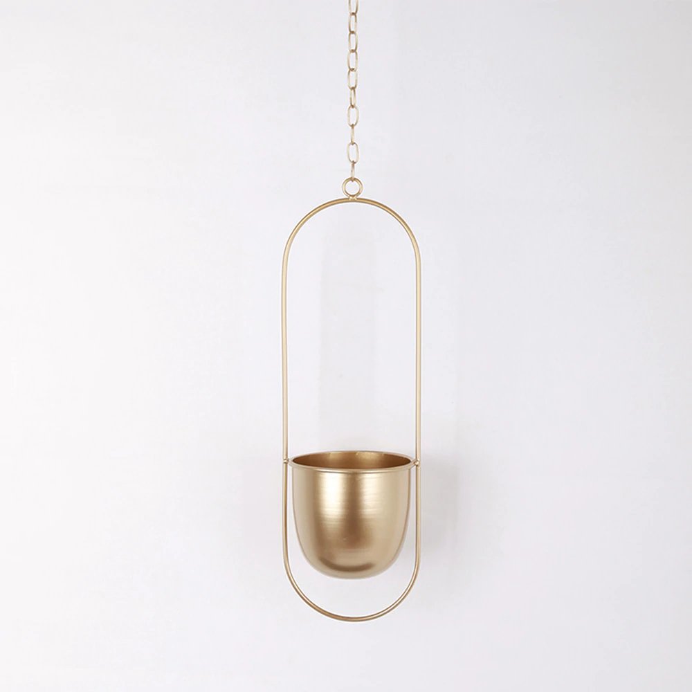 Modern metal hanging plant pot, perfect for succulents, herbs, and flowers.