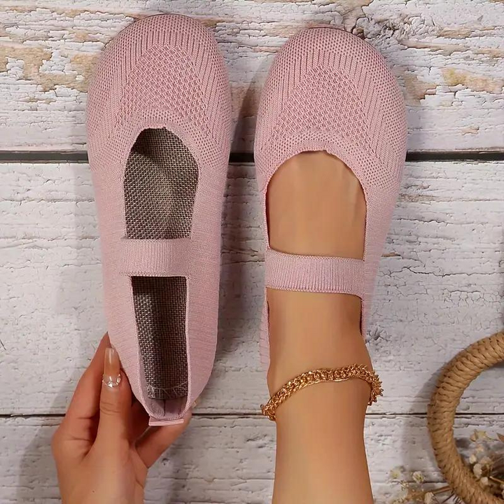 Fashionable women's Mary Jane flats with a wedge sole. Ideal for everyday comfort and style.