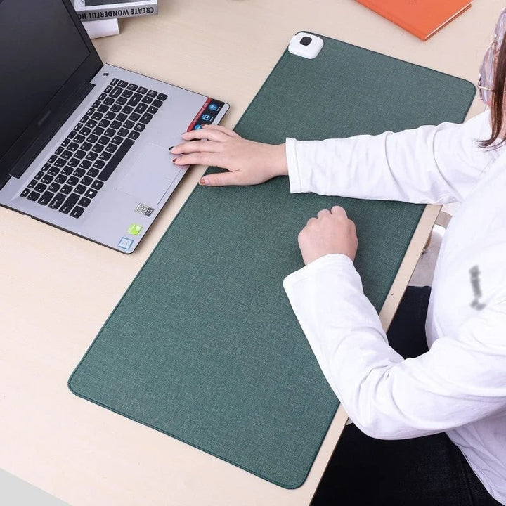 Cozy felt heated desk pad, perfect desk warmer & office accessory for chilly home office or ergonomic workspace.