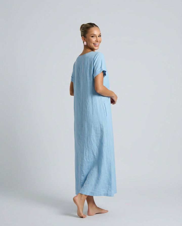 Flowy women's relaxed midi dress in motion. Comfortable, crinkled texture, timeless casual short sleeve summer style.
