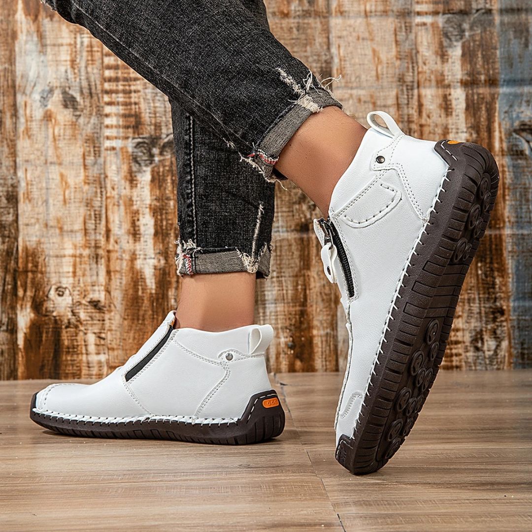Stylish men's ankle boots, orthopedic comfort, with durable stitched details and an easy side zip.
