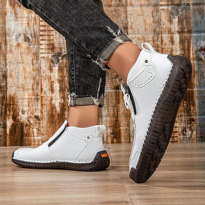 Stylish men's ankle boots, orthopedic comfort, with durable stitched details and an easy side zip.