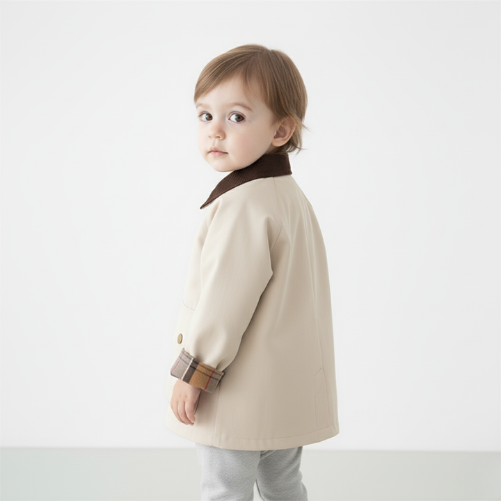 Comfortable youth boys' jacket featuring smart plaid cuffs, perfect for spring or fall adventures.