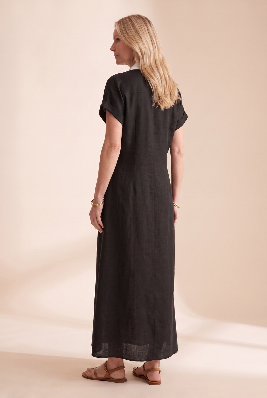 Women's short-sleeve flowy maxi dress, featuring a stylish button front for an easy summer look.