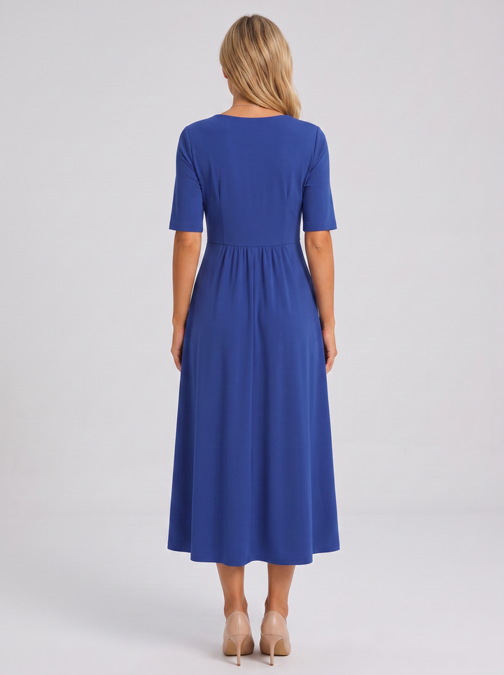 Stylish V-neck wrap maxi dress, close-up of flattering neckline and comfortable short sleeves for women.